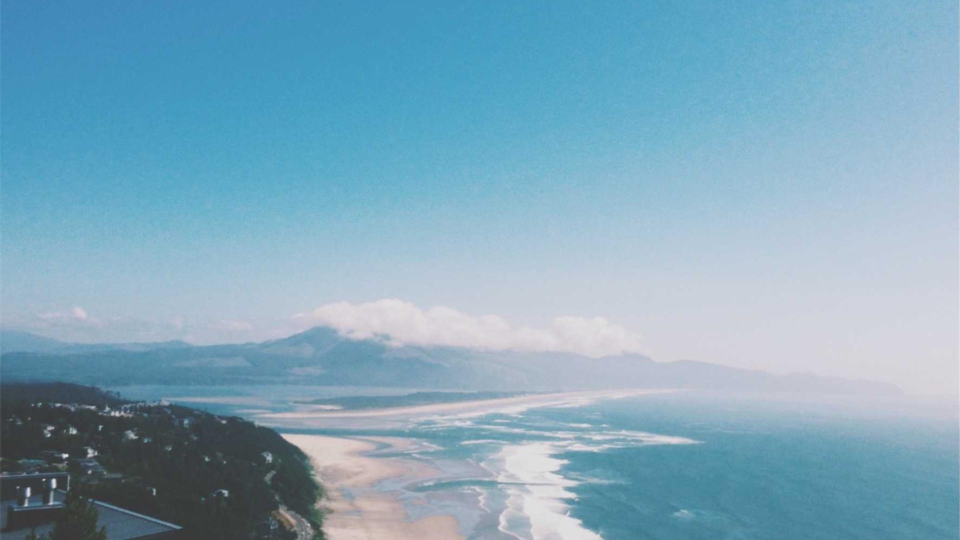 A group of diverse people smiling and exercising outdoors.