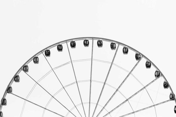 A stack of fluffy protein pancakes topped with berries.